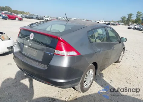 2011 Honda Insight z USA, uszkodzony, nr VIN JHMZE2H36BS008807